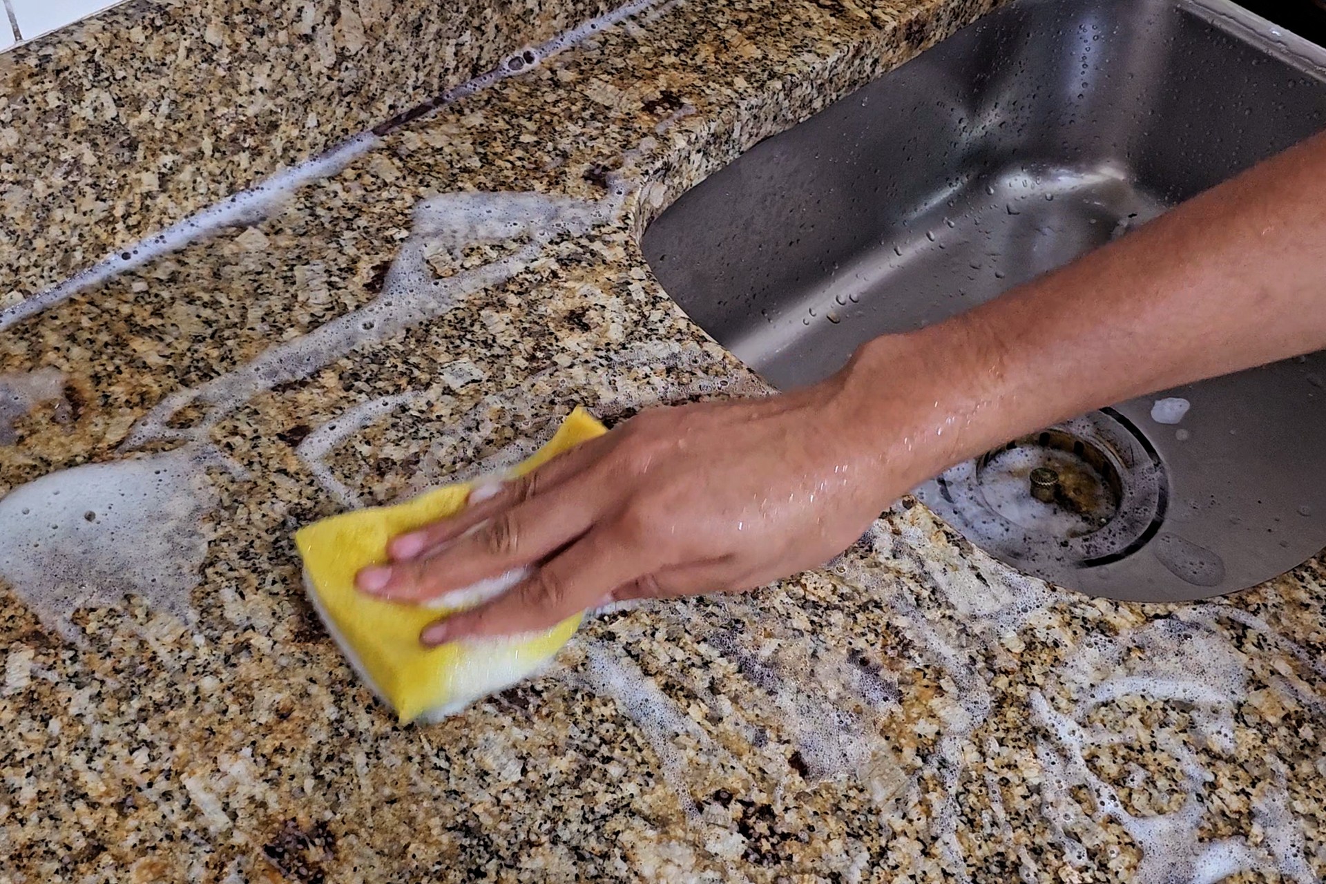 Washing the kitchen sink